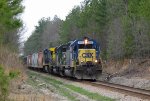 CSX 8470 leads a train northbound (compass east)